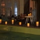 thumbnail image 4 of Velas sin llama grandes impermeables para exteriores de 10 x 4 pulgadas con control remoto y temporizador, velas de pilar LED intermitentes que funcionan con pilas para sillones reclinables al aire libre, porche, de larga duración, juego de 2 marfil oscuro 4 "x6" 8 "10", 4 of 5