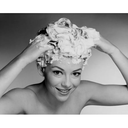 Portrait of a young woman shampooing her hair Canvas Art - (24 x 36)