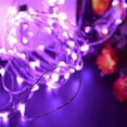 thumbnail image 2 of Cadena de luces que funciona con pilas con 20 micro LED rosas en un cable plateado., 2 of 2