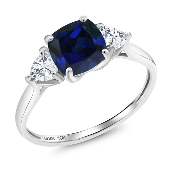 Gem Stone King 10K White Gold Blue Created Sapphire and White Moissanite 3-Stone Engagement Ring for Women (2.46 Cttw, 7MM Cushion and 4MM Trillion, Size 7)
