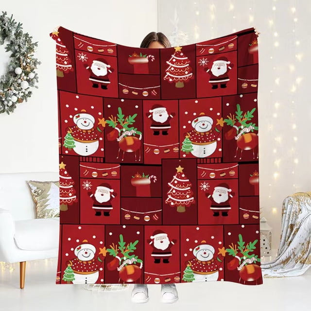 manta de felpa francesa de la serie navideña manta de felpa manta para la siesta en casa o en la oficina, cobija multicolor con vista frontal centrada en patrón cuadriculado rojo que muestra Papá Noel, muñecos de nieve, árboles de Navidad y campanas; felpa suave y borde cosido visible, colocada sobre sofá claro con luces decorativas, suele usarse también para reposar en la oficina o en viajes cortos.