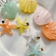 thumbnail image 4 of 4 horquillas para el pelo con forma de estrella de mar y concha para mujeres y niñas., 4 of 5