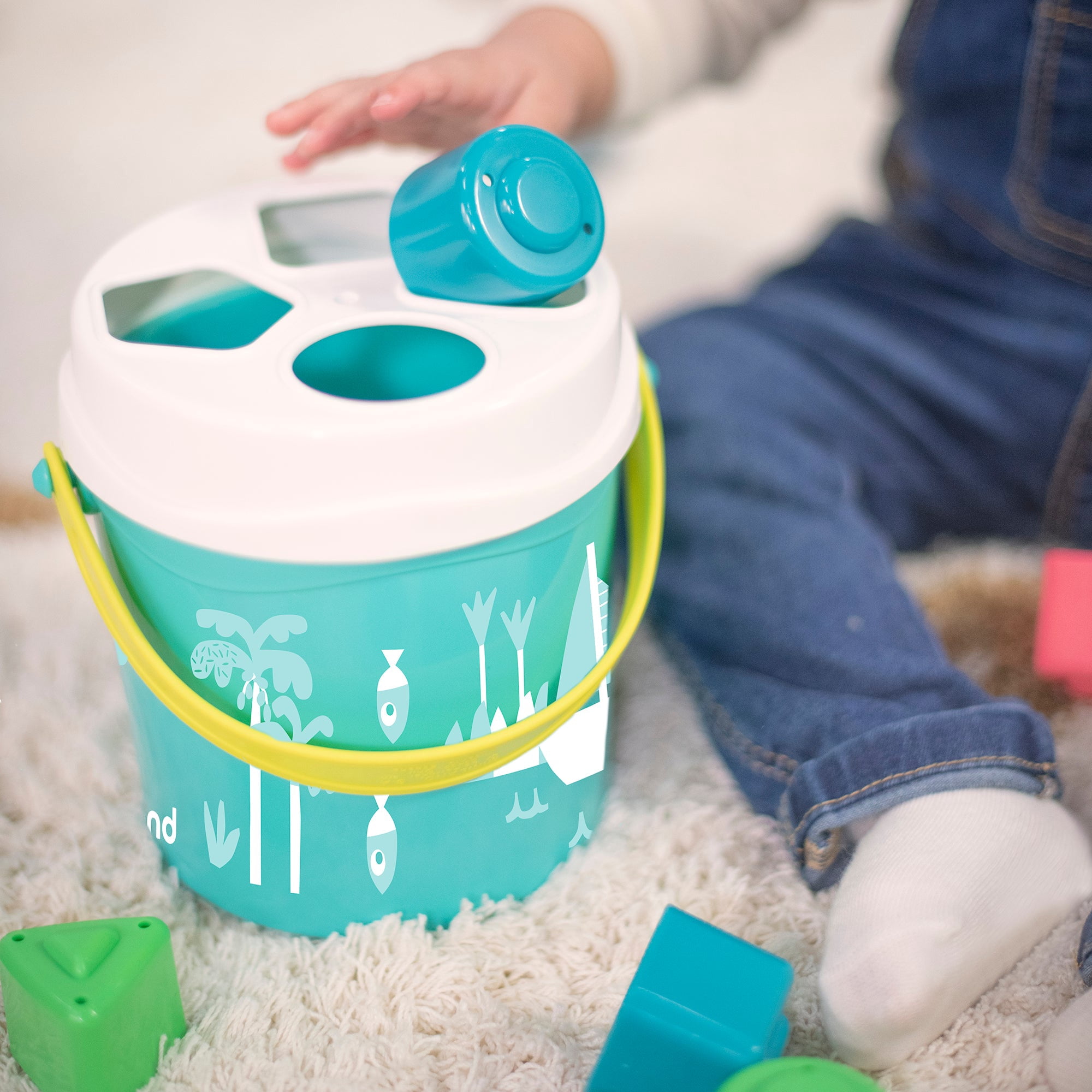 Miniland Feel to Learn Shape sorting bucket
