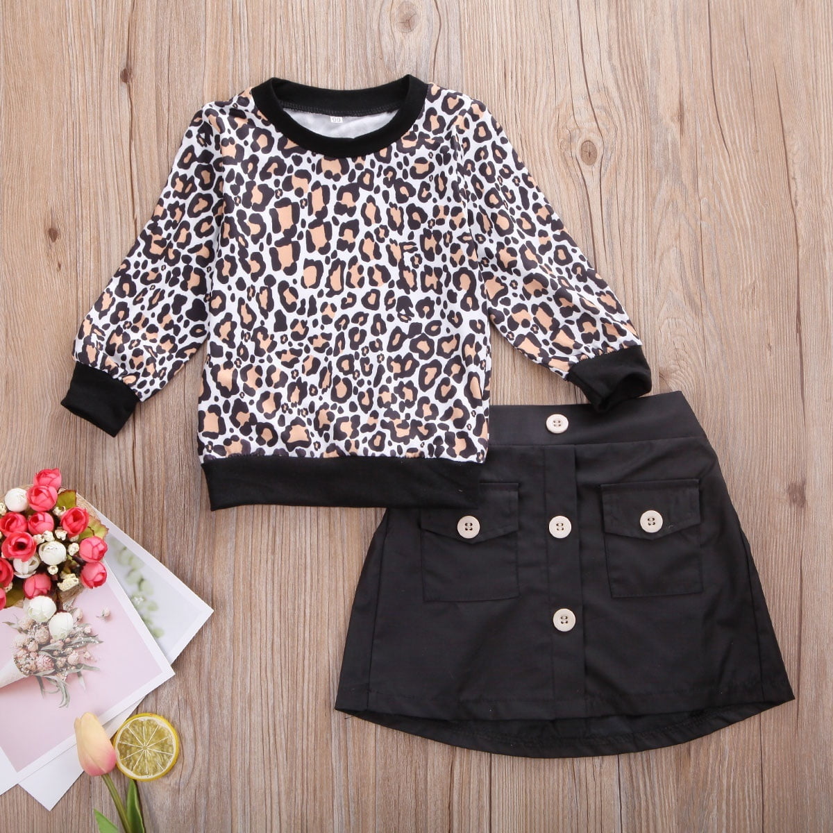 leopard print top and leather skirt