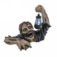 thumbnail image 3 of Estatua de Zombi Con Linterna LED solar ANGGREK resina 19x9,5x15 cm, 3 of 8