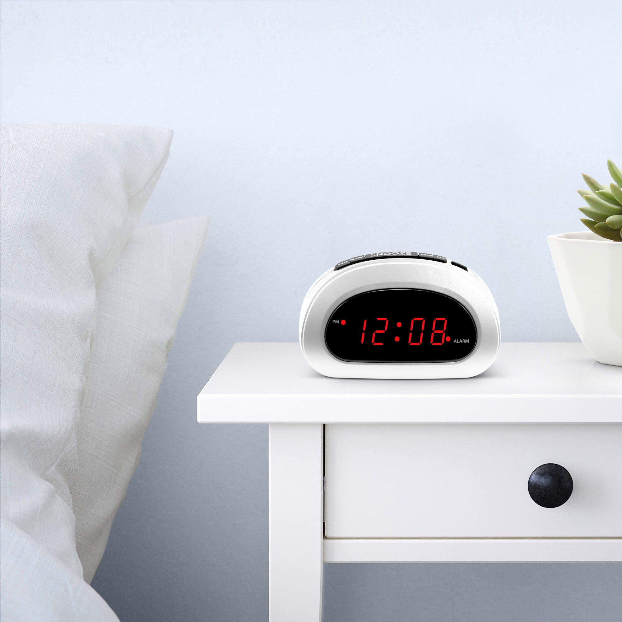 Mainstays Digital Alarm Clock with Snooze and Battery Backup, Easy to Use Top Button Controls, White Case with .6” Red Easy to Read LED Display, SPC089B