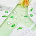 thumbnail image 4 of Kit de cuentas florales: 6 estilos de flores acrílicas y hojas, cuentas de cristal blancas con forma de flor y 3 estilos de hojas verdes (tulipanes, campanillas, lirios y flores de tres pétalos)., 4 of 7