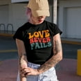 thumbnail image 2 of Love Never Fails, Quote from 1 Corinthians 13 Bible Scripture, Groovy Retro Wavy Text Merch Gift, Military Green T-Shirt, Large, 2 of 5