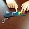 thumbnail image 4 of Rock And Roll It - Micro Rainbow Piano. Llavero de piano de trabajo real y reproducible. Colgar en u, 4 of 6