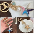 thumbnail image 3 of unbranded Llavero Decorativo En De De Mar Con Y Perla Falsa Para Regalo Especial, 3 of 8