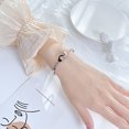 thumbnail image 1 of Brazalete Esposas Doble Hebilla Conjunto de Acero Inoxidable con Zircon Círculo Geométrico Brazalete de Acero Titanio ShuxiuWang 9024735136453, 1 of 1
