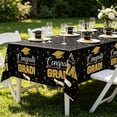 thumbnail image 4 of Kit de decoración para la fiesta de graduación de la promoción de 2026: pancartas de felicitación en negro y dorado, globos, centros de mesa de nido de abeja y mantel para la fiesta de graduación., 4 of 6