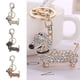 thumbnail image 1 of Llavero con diseño de perro salchicha, adorno colgante con incrustaciones de diamantes de imitación, colgante para bolsos, 1 of 5
