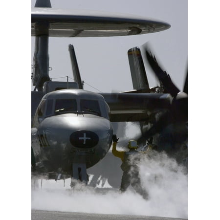 Canvas Print A U.S. Navy plane director directs the pilot of an E-2C Hawkeye aircraft to the catapult for launch Stretched Canvas 10 x