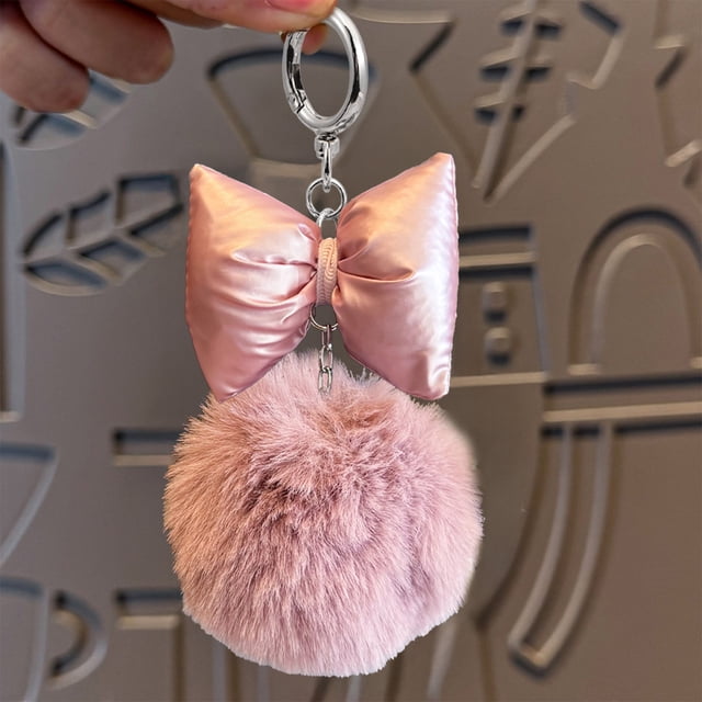 Bolsa redonda navideña para niña | Llavero con lazo para bolsos y llaves | Colores rosa y gris | Idea de regalo para estas fiestas
