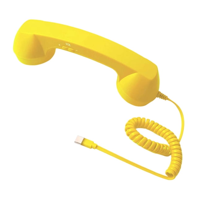 Teléfono retro vintage con micrófono y altavoz para llamadas móviles. amarillo