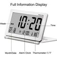 thumbnail image 3 of Reloj despertador LCD portátil con batería, visualización de fecha y temperatura, función de repetición, luz nocturna y estuche de cuero, 3 of 8