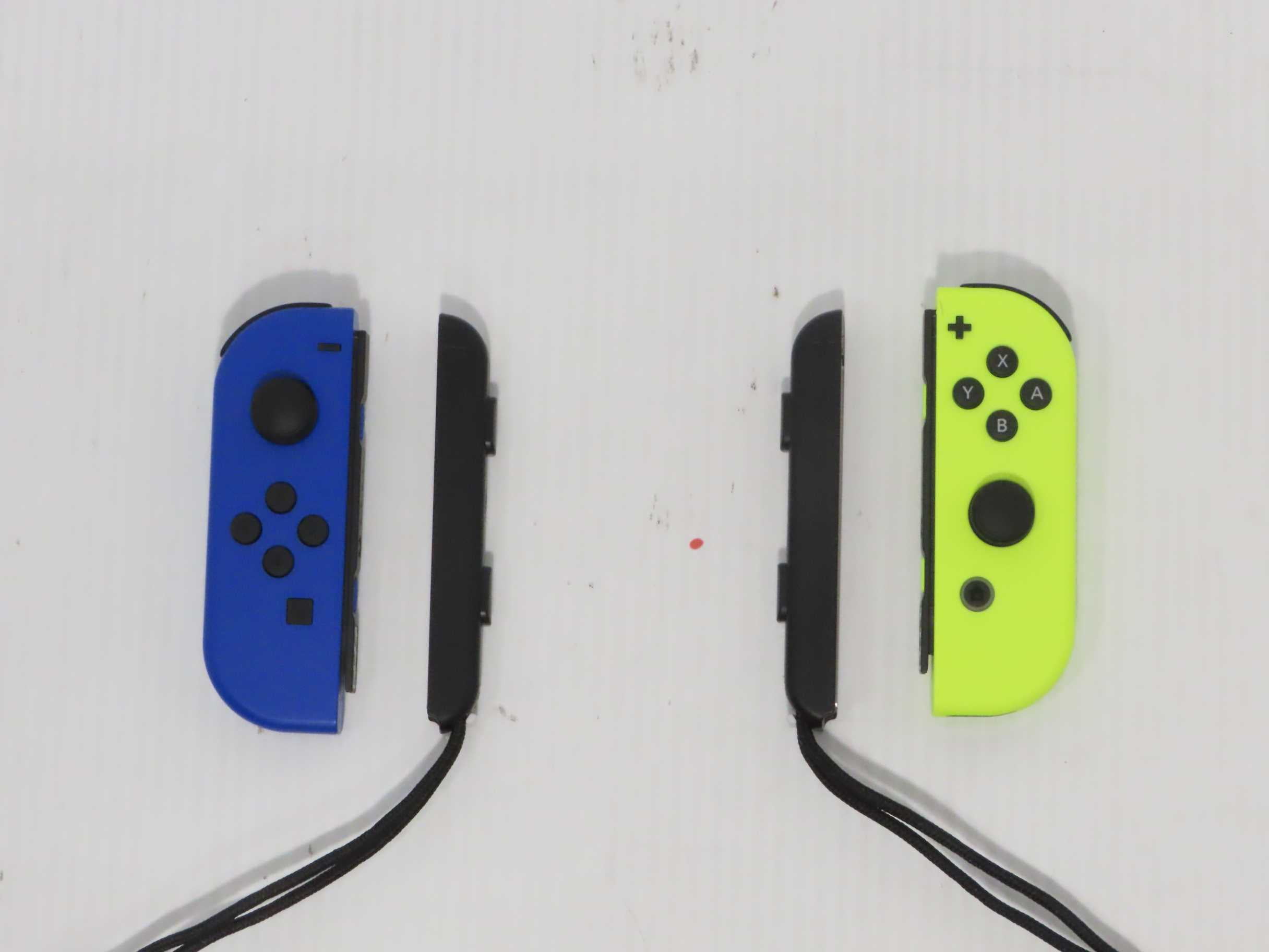 Refurbished Nintendo Blue/ Neon Yellow JoyCon (LR) Switch Walmart