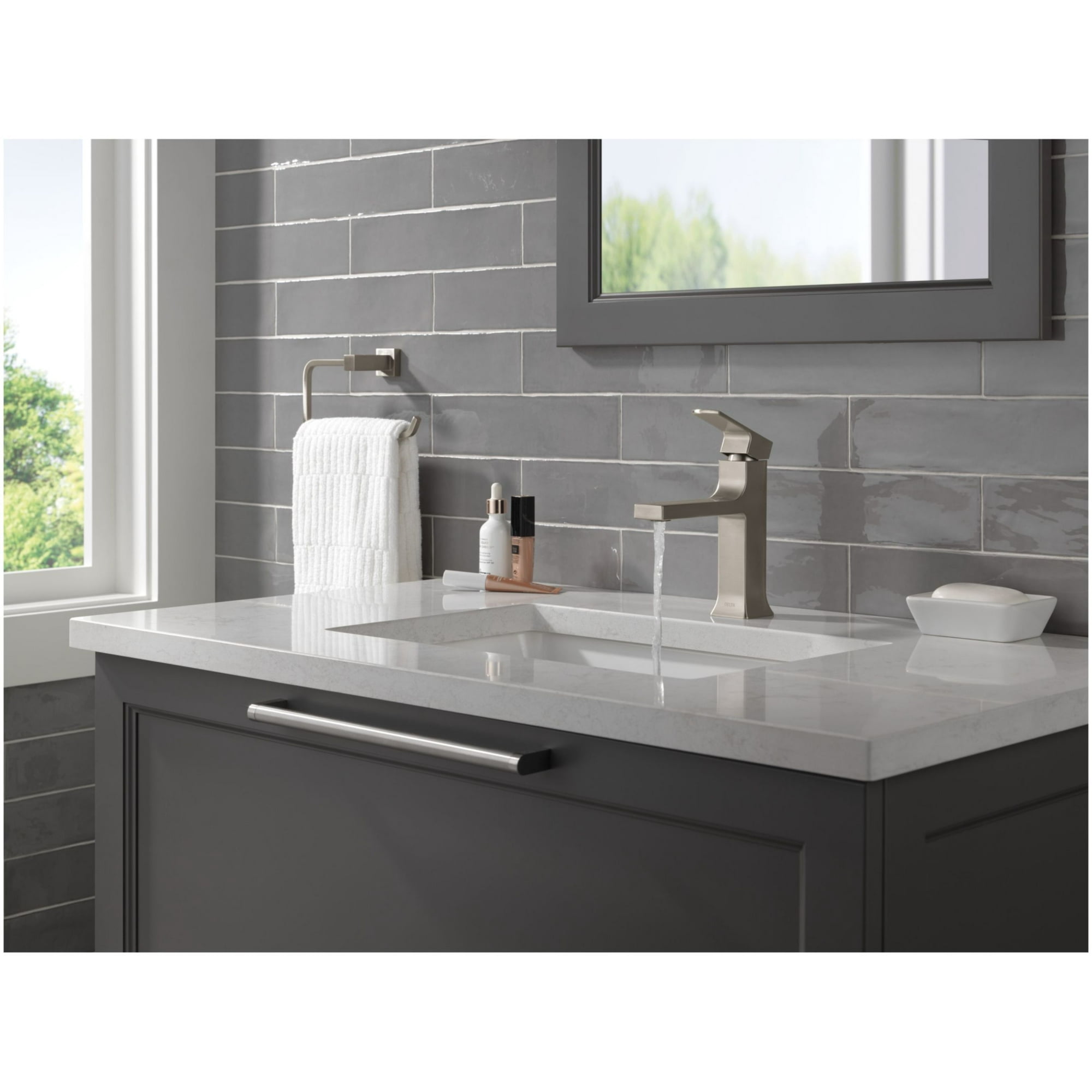 Velum Single Handle Single Hole Bathroom Faucet with Deckplate Included and Drain Kit Included in Champagne Bronze