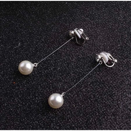 Clip on 2 1/4 long silver wire white pearl dangle earrings with clear stone