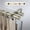 Light Gold, variant on Central Design 100-50-999-D 1 in. Cap Double Curtain Rod with 120 to 170 in. Extension, Bronze