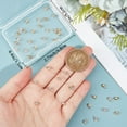 thumbnail image 3 of 1 caja de 50 dijes de diamantes de imitación chapados en oro de 18 quilates con piedras de nacimiento de abril., 3 of 6
