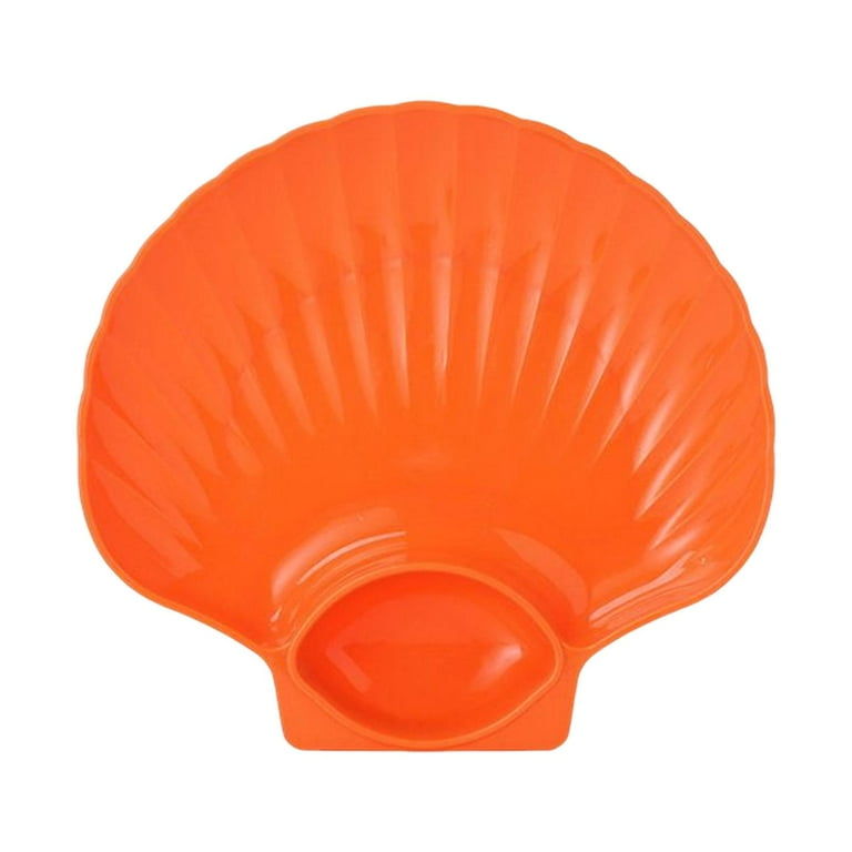 Plate with sauce holder outlet