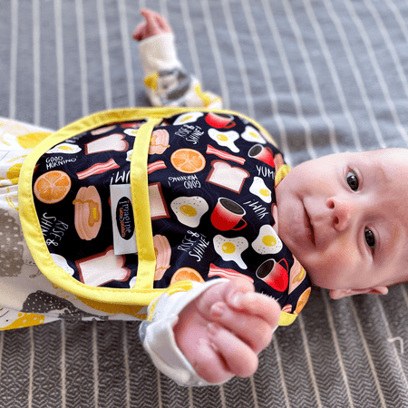 

Imagine Baby Products Waterproof Bib | Adjustable Feeding & Drooling Bibs for Babies | Snap-On Machine Washable Bib with Pocket to Catch Spills | Variety of Fun Patterns (Bacon Me Crazy)