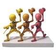 thumbnail image 3 of Sculpture Squelettes Dansants Rose, Orange, Jaune Ensemble de Têtes de Mort, 3 of 3