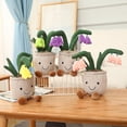 thumbnail image 1 of Juguete de peluche con forma de campanilla realista, en maceta, 25 cm, 1 of 4