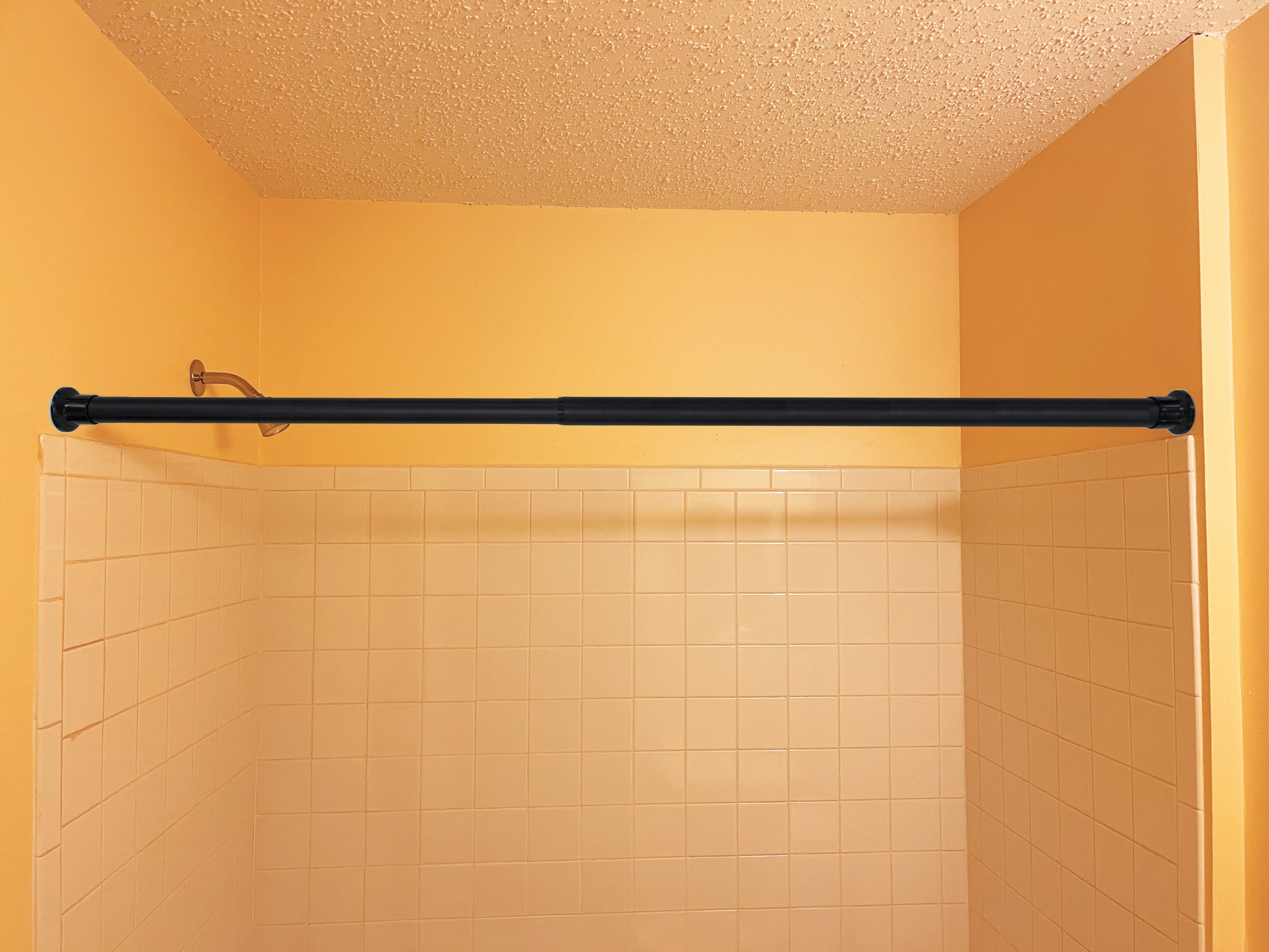 Adjustable 29-inch to 47-inch Steel Curtain Rod for Shower, Doorway, Window - Plastic Heads, Black Color - Easy Installation without Drilling