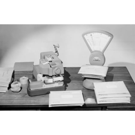 Close-up of a weight scale and postage meter machine on a table Canvas Art - (18 x 24)