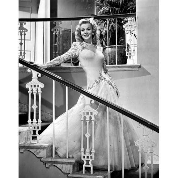 Carole Landis on a Gown smiling and posed Photo Print (24 x 30)