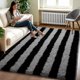 thumbnail image 1 of Alfombra Zentavio de felpa suave a rayas negras y grises, 122 x 183 cm, 1 of 8