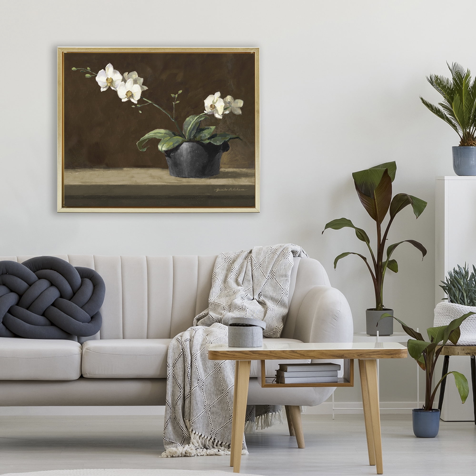 Stupell Industries Potted White Orchid on Ledge Gold Framed Floater Canvas Wall Art, design by Yumiko Ichikawa