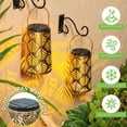 thumbnail image 4 of ROSHWEY 4 Pack Outdoor Solar Hanging Lantern Lights Metal LED Decorative Light for Garden Patio Yard Lawn and Tabletop with Hollowed-Out Design, Bronze Color, Leaf Pattern, 4 of 8
