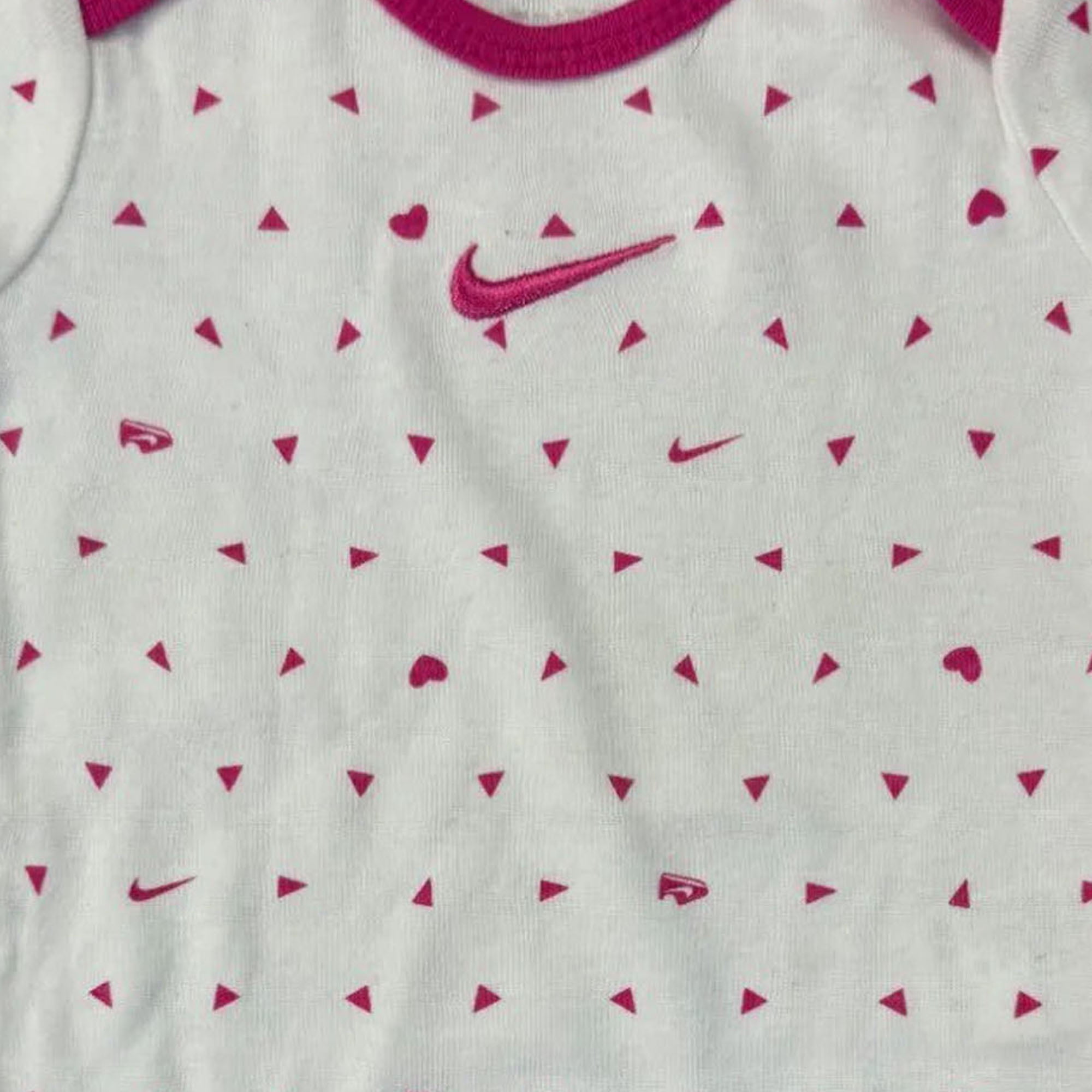white and pink nike outfit