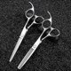 thumbnail image 2 of Tijeras de peluquería de 6 pulgadas, de acero inoxidable japonés, con cuchillas afiladas de precisión y mango ergonómico. Ref.: 7809, 2 of 5