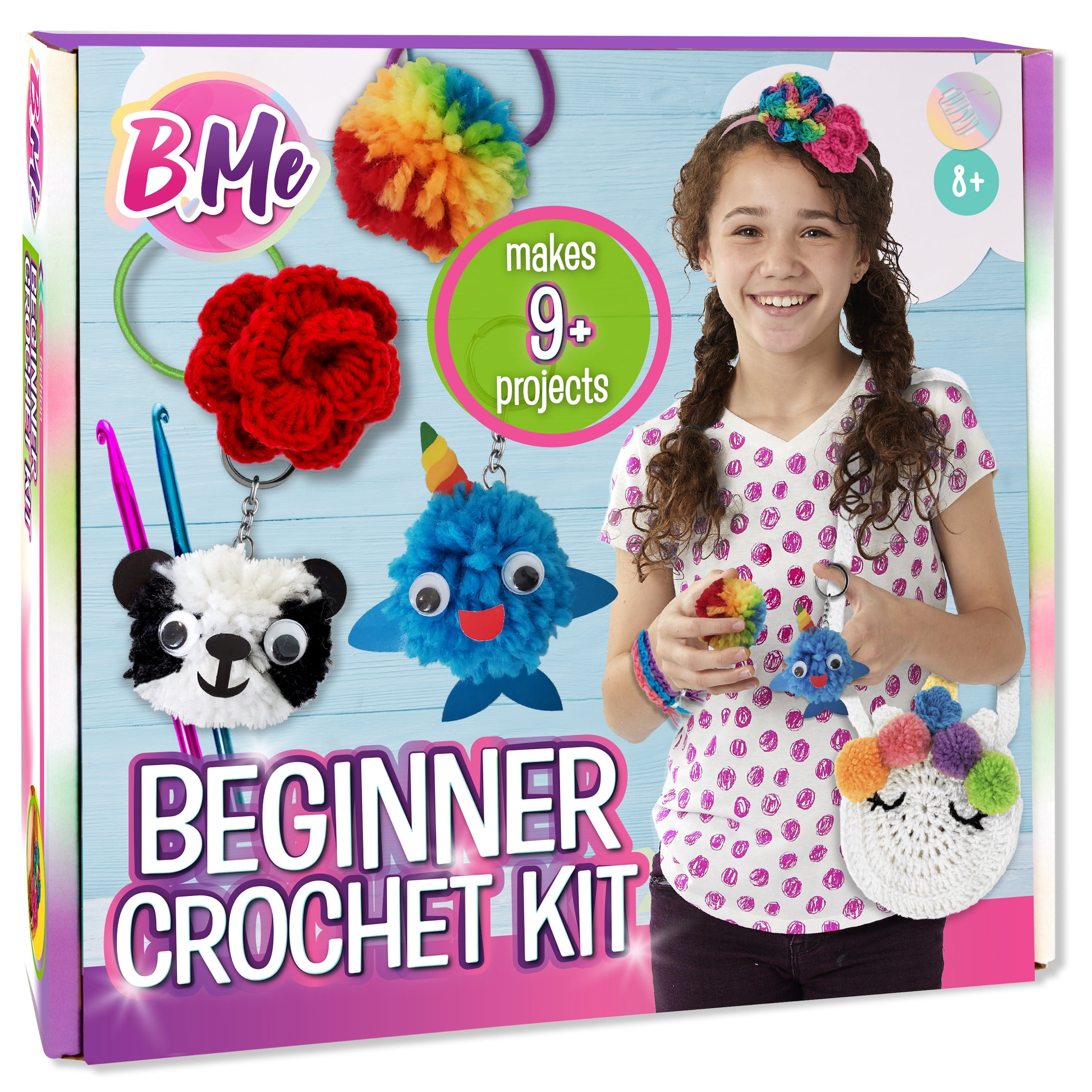 The colorful box packaging of the Creative Kids Beginner Crochet Kit features a girl with multiple crochet creations in the form of pom poms, animals, and flowers.