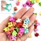 thumbnail image 3 of 100 piezas de pinzas para el cabello con forma de flor de colores dulces, pinzas pequeñas para el flequillo, accesorios para el cabello para niñas y adultos, 3 of 6