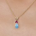 thumbnail image 3 of Gem Stone King 14K Yellow Gold Swiss Blue Topaz and Red Created Ruby Pendant Necklace for Women | 0.83 Cttw | Gemstone November Birthstone | Pear Shape 7X5MM | With 18 inch Chain, 3 of 6