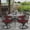 Antique Bronze / Red, variant on SOCIALCOMFY 5-Piece Outdoor Patio Dining Set, All-Weather Cast Aluminum Patio Table Set, Include 4 Swivel Chairs and a 35.4 inch Round Table w/Umbrella Hole for Balcony Garden Backyard, Khaki