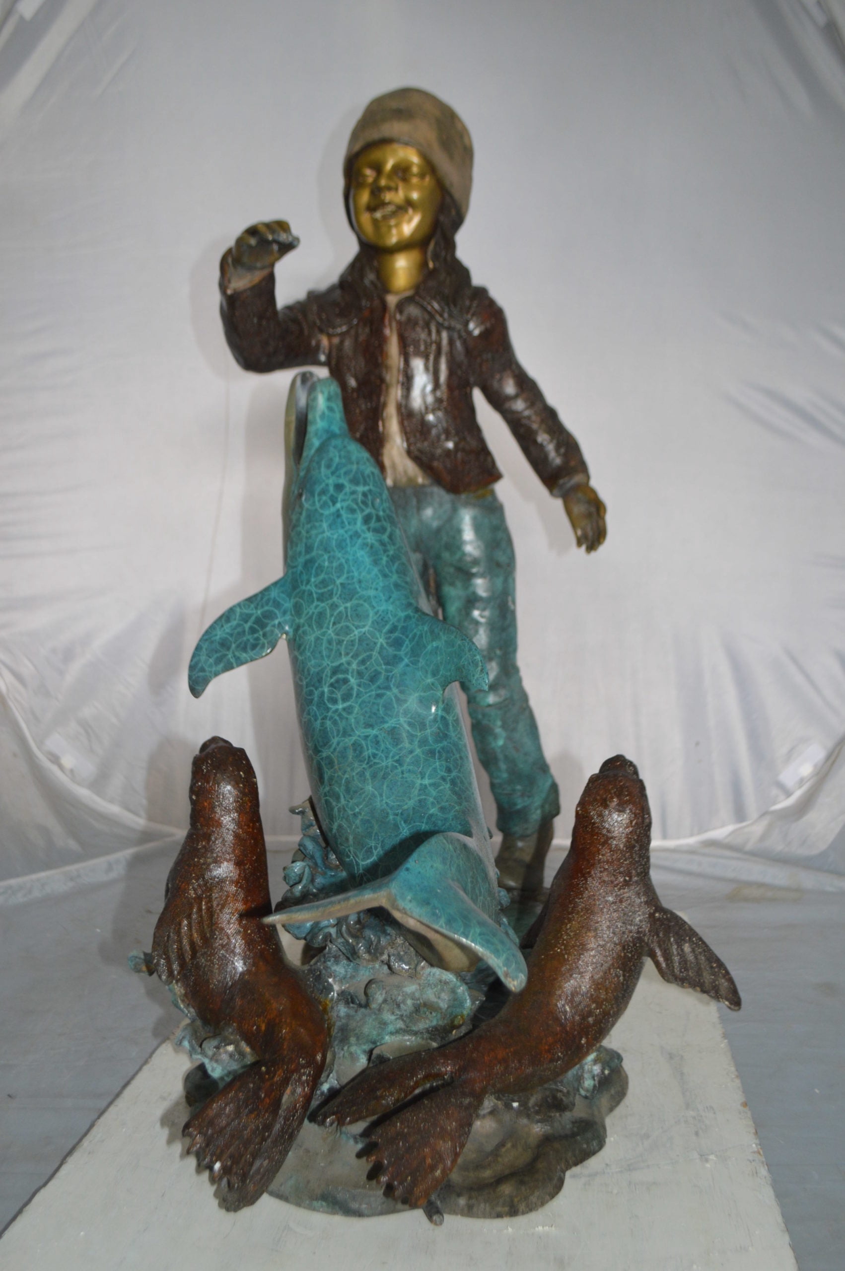 Nifao Girl feeding a dolphin and seals – Outdoor Bronze Fountain, Garden Water Feature, 28"L x 17"W x 37"H
