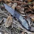 thumbnail image 2 of Ozark Trail 7.5-inch Folding Stainless Steel Knife with Camo Handle and Serrated Drop Point Blade, 2 of 10