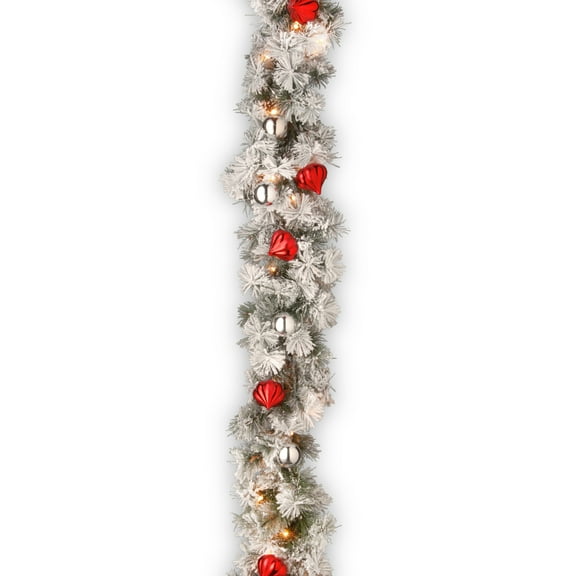 National Tree Company Pre-Lit Artificial Christmas Garland, Green, Snowy Bristle Pine, Red and Silver Ornaments, 70 Clear Lights, 9 Feet