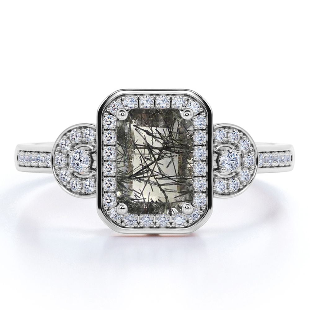 JeenMata 1.75 Carat - Emerald Cut Black Rutile Quartz - Moissanite Trilogy Halo - Channel Pave Engagement Ring - 18K White Gold Plating Over Silver
