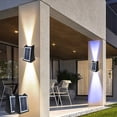 thumbnail image 1 of Luz solar para paredes exteriores • Aplique LED de jardín arriba y abajo • IP65 Impermeable • Luz cálida y de color • Fácil de instalar, 1 of 7