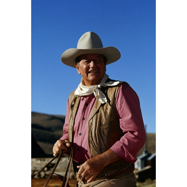 John Wayne in The Train Robbers The Duke on horse smiling with stetson