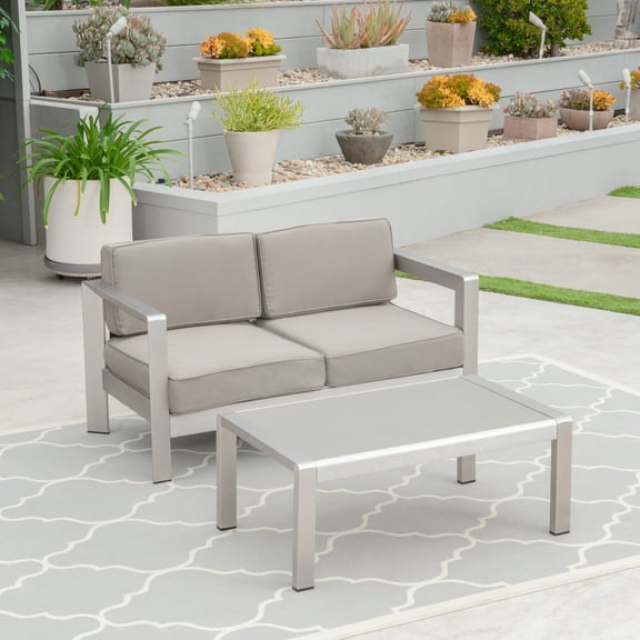 GDF Studio Alec Outdoor Aluminum Loveseat and Tempered Glass Topped Coffee Table, Silver and Khaki