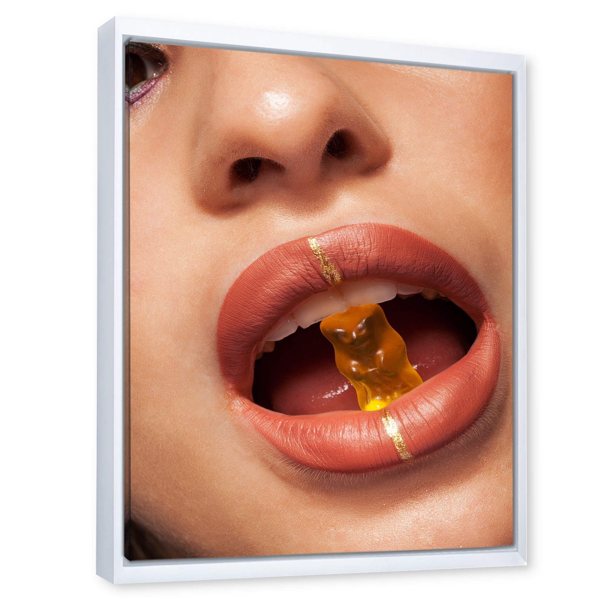Designart 'Close Up VIew of Female Lips Biting Gummy Bear' Modern Framed Canvas Wall Art Print